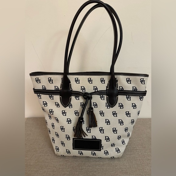 Dooney & Bourke Handbags - Dooney & Bourke tassel bag